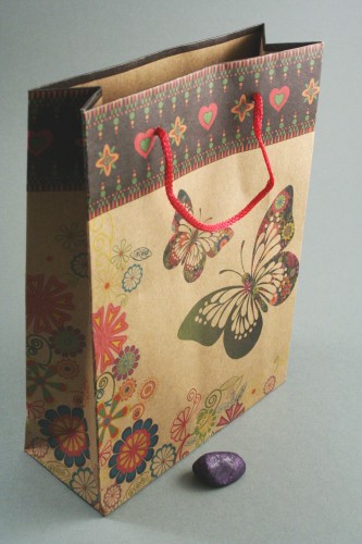 Natural Brown Paper Gift Bag with Butterfly Print and Corded Handle. Approx Siz 20cm x 15cm x 6cm.