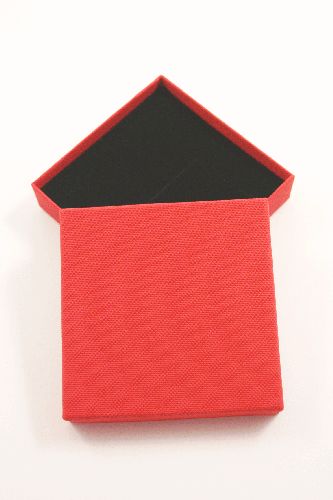 Red Gift Box with Black Flock Inner with two corner slits for a chain and a centre 40mm slit. Approx Size 9cm x 9cm x 2.2cm