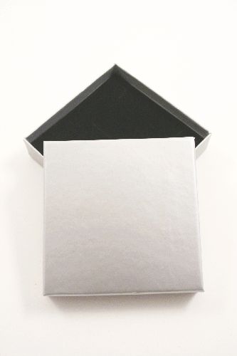 Silver Grey Giftbox. This Box Has a Black Flocked Foam Pad  insert with two corner slits for a chain and a centre 40mm slit. Approx Size 9cm x 9cm x 2.2cm.