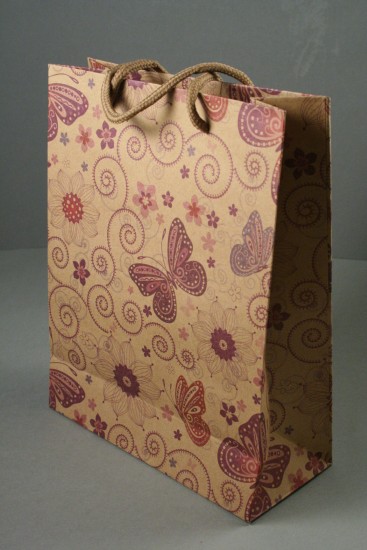 Natural Brown Paper Gift Bag with Purple Printed Flowers / Butterflies. Approx Size 24cm x 19cm x 8cm.