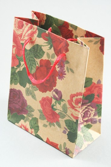 Natural Brown Paper Giftbag with Floral Print and Corded Handle. Size Approx 14.5cm x 11.5cm x 6cm.