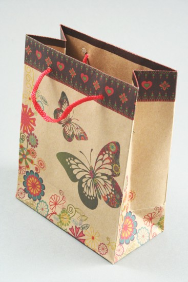 Natural Brown Paper Giftbag with Floral and Butterfly Print and Corded Handle. Size Approx 14.5cm x 11.5cm x 6cm.