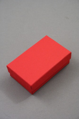 Red Cardboard Gift Box with Black Flock Inner. Approx Size. 5cm x 8cm x 2.5cm