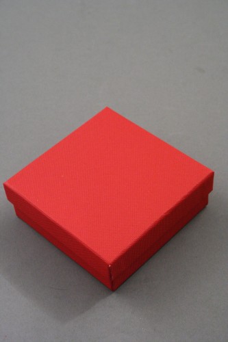 Red Cardboard Giftbox with Black Flock Inner. Approx Size. 9cm x 9cm x 3cm.