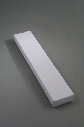 White Giftbox with White Flocked Inner. Approx Size 21cm x 4cm x 2cm.