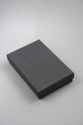Black Giftbox with Black Flock Inner. Approx Size 7cm x 11cm x 2.2cm