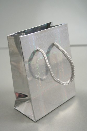 Silver Snowflake Christmas Print Holographic Gift Bag with Grey Cord Handles. Approx Size 10cm x 8cm x 4.5cm