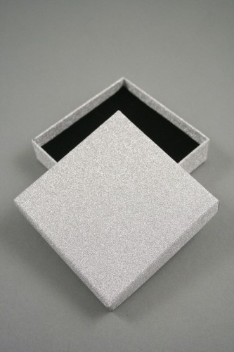 Silver Glitter Gift Box. Size Approx 9cm x 9cm x 3cm. This box has a black flocked foam pad insert