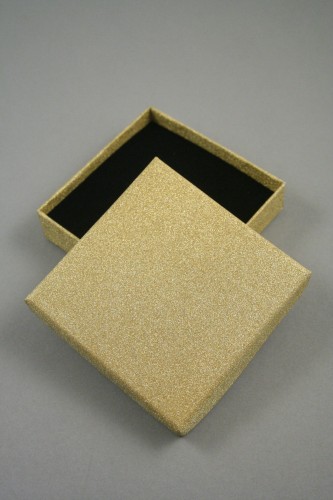 Gold Glitter Gift Box. Size Approx 9cm x 9cm x 3cm. This box has a black flocked foam pad insert