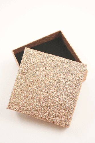 Rose Gold Glitter Gift Box. Size Approx 9cm x 9cm x 3cm. This box has a black flocked foam pad insert with two corner slits for a chain and a centre 40mm slit