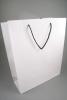 Matt Finish White Gift Bag with Black Corded Handle. Approx Size 32cm x 26cm x 10cm - view 2