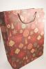 Red Kraft Paper Gift Bag with Christmas Baubles Print with Red Cord Handles. Size Approx 42cm x 31cm x 15cm - view 1