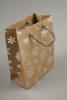 Natural Brown Kraft Paper Gift Bag with Silver Foil Snowflake Print and Brown Corded Handles. Size Approx 15cm x 12cm x 6cm. - view 2