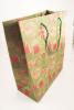 Green Kraft Paper Gift Bag with Christmas Present Print and Green Cord Handles. Size Approx 32cm x 26cm x 12cm. - view 2