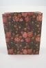 Black Floral Printed Kraft Paper Gift Bag with Black Corded Handles. Size Approx 24cm x 19cm x 8cm. - view 1