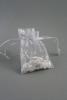 White Organza Gift Bag with Silver Snowflake Print. Size Approx 10cm x 7.5cm. - view 1